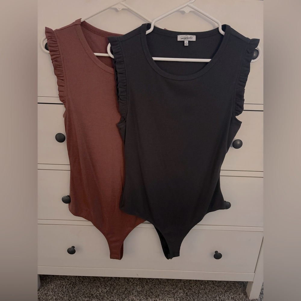 Magnolia Ribbed Bodysuits in charcoal grey and dusty pink.  Size M